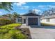 Charming single-story home with a well-manicured lawn and a freshly painted exterior at 509 13Th Nw Ave, Largo, FL 33770