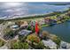 Gorgeous waterfront home with mature trees and lush landscaping, providing privacy and beautiful views of the canal at 550 7Th S St, Safety Harbor, FL 34695