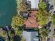 Stunning waterfront residence with a private dock, mature trees, and serene canal views from above at 550 7Th S St, Safety Harbor, FL 34695