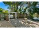 Charming backyard with a swing and decorative bird bath at 550 7Th S St, Safety Harbor, FL 34695