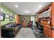 Comfortable living area with built-in shelving and an adjacent office area at 550 7Th S St, Safety Harbor, FL 34695