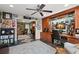 Spacious office with custom wood built-ins, providing ample storage and workspace at 550 7Th S St, Safety Harbor, FL 34695