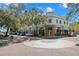 Busy street view with restaurants, shops, and a roundabout, showcasing a lively commercial area with parking at 550 7Th S St, Safety Harbor, FL 34695