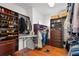 Organized walk-in closet with custom shelving, drawers, and ample storage space for clothing and shoes at 550 7Th S St, Safety Harbor, FL 34695