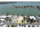 Aerial view of a vacant waterfront lot surrounded by beautiful homes with waterfront access at 575 Crystal Dr, Madeira Beach, FL 33708