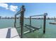 Dock with a boat lift provides easy access to the water at 575 Crystal Dr, Madeira Beach, FL 33708