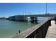 Scenic view of the bridge over the water, showcasing a landmark with pedestrian access and boaters enjoying the day at 575 Crystal Dr, Madeira Beach, FL 33708