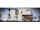 Modern home exterior shows a three-story design with white and wood accents at 575 Crystal Dr, Madeira Beach, FL 33708