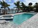 Inviting pool with a hot tub with easy access to the waterfront at 575 Crystal Dr, Madeira Beach, FL 33708