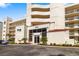 Exterior daytime view of the building, showcasing its entrance and landscaping at 6061 Bahia Del Mar Cir # 442, St Petersburg, FL 33715