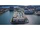 Aerial view of the community featuring a variety of amenities and beautiful landscaping at 7645 Sun Island S Dr # 201, South Pasadena, FL 33707
