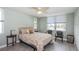 Comfortable bedroom featuring natural light and a ceiling fan, perfect for relaxation at 7645 Sun Island S Dr # 201, South Pasadena, FL 33707