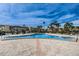 Relax and unwind at the community pool amidst meticulously landscaped grounds, ideal for leisure and enjoyment at 7645 Sun Island S Dr # 201, South Pasadena, FL 33707
