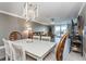 Open-concept dining room and living room with a view of the water at 7645 Sun Island S Dr # 201, South Pasadena, FL 33707