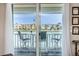 Water view from lanai with seating and outdoor dining area at 7645 Sun Island S Dr # 201, South Pasadena, FL 33707