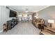 Spacious living room featuring an open-concept design and lots of natural light at 7645 Sun Island S Dr # 201, South Pasadena, FL 33707