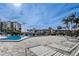 Relax on the spacious pool deck with comfortable lounge chairs, perfect for soaking up the sun at 7645 Sun Island S Dr # 201, South Pasadena, FL 33707