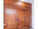 A view of storage space with wooden doors and steel fixtures at 7645 Sun Island S Dr # 201, South Pasadena, FL 33707