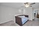 Comfortable loft area with a daybed, soft carpet, and neutral decor at 8512 Reedville St, New Port Richey, FL 34654