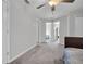 Spacious bedroom with carpet flooring and views into other bedrooms and hallways at 8512 Reedville St, New Port Richey, FL 34654