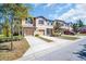 Inviting townhomes featuring attached garages and manicured landscaping at 8512 Reedville St, New Port Richey, FL 34654