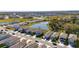 Aerial shot of the neighborhood highlighting the home's desirable location near community pond at 9008 Waxwing Way, Parrish, FL 34219