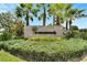 Community sign for Summerwoods with lush landscaping at 9008 Waxwing Way, Parrish, FL 34219