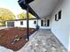 Charming home with a brick walkway leading to the front door and well-manicured landscaping at 9308 Pinero St, Spring Hill, FL 34608