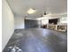 Spacious garage with overhead lighting, ample storage, and work space at 9308 Pinero St, Spring Hill, FL 34608