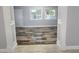 Open living room and entry featuring tile floors, neutral paint, and natural light at 9308 Pinero St, Spring Hill, FL 34608