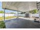 Large covered patio with shed in a fenced backyard offers private outdoor living at 10309 108Th Ave, Largo, FL 33773