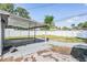 Covered patio area and fenced backyard offering a space for outdoor entertaining at 10309 108Th Ave, Largo, FL 33773