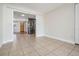 Open floorplan featuring a tiled dining area with access to a modern kitchen at 10309 108Th Ave, Largo, FL 33773