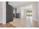 Contemporary kitchen with tile flooring, stainless steel appliances and grey cabinets at 10309 108Th Ave, Largo, FL 33773