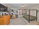 Comfortable bedroom featuring natural light, modern accents, and ample closet space at 10315 Riverdale Rise Dr, Riverview, FL 33578