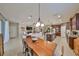 Bright open-concept living area, seamlessly connecting dining and kitchen spaces at 10315 Riverdale Rise Dr, Riverview, FL 33578