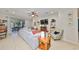 Comfortable living room with a sliding glass door to the backyard patio at 10315 Riverdale Rise Dr, Riverview, FL 33578