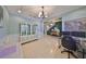 Open floorplan featuring the home office with decorative ceiling and tile floors at 10315 Riverdale Rise Dr, Riverview, FL 33578