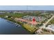 Aerial view of waterfront community with boat docks and nearby amenities at 1076 Paseo Del Rio Ne, St Petersburg, FL 33702
