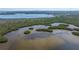 Aerial view showing expansive view of the water and natural beauty surrounding the property at 1076 Paseo Del Rio Ne, St Petersburg, FL 33702