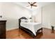 Inviting bedroom with wood floors, a comfortable bed, and natural light at 1076 Paseo Del Rio Ne, St Petersburg, FL 33702