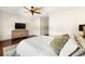 Bright bedroom with wood floors, large dresser, and comfortable bed at 1076 Paseo Del Rio Ne, St Petersburg, FL 33702
