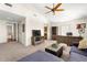 The bonus room is well-lit and features vaulted ceilings and comfortable furniture at 1076 Paseo Del Rio Ne, St Petersburg, FL 33702