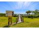 Enjoy access to a nearby boardwalk and informational sign at this beautiful home at 1076 Paseo Del Rio Ne, St Petersburg, FL 33702