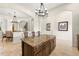 Spacious kitchen island featuring granite countertop and seating with bar stools at 1076 Paseo Del Rio Ne, St Petersburg, FL 33702