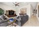 Inviting living room featuring plush sofas, a flat-screen TV, and warm ambient lighting at 1076 Paseo Del Rio Ne, St Petersburg, FL 33702