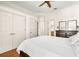 Bright main bedroom features an ensuite bathroom, walk-in closet, and serene décor at 1076 Paseo Del Rio Ne, St Petersburg, FL 33702