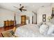 Spacious bedroom with four-poster bed, wood floors, and elegant decor at 1076 Paseo Del Rio Ne, St Petersburg, FL 33702