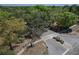 Aerial shot of a park intersection showcasing surrounding green tree coverage at 10928 N 15Th St, Tampa, FL 33612