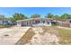 Charming single-story home with a well-maintained front yard and concrete driveway at 10928 N 15Th St, Tampa, FL 33612